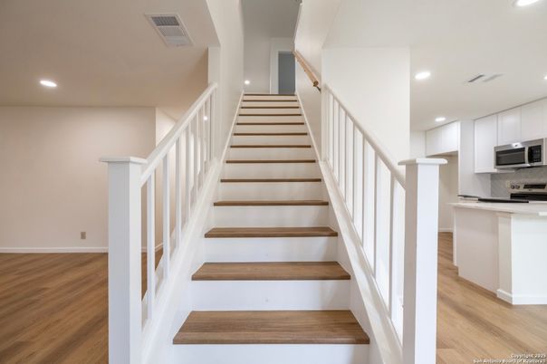 Interior, Kitchen, Recessed Lighting, Stainless Steel Appliances, Wood Texture Flooring