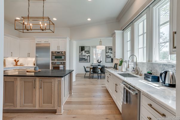 Dining room, Interior, Kitchen, Pendant Lights, Recessed Lighting, Stainless Steel Appliances, Wood Texture Flooring