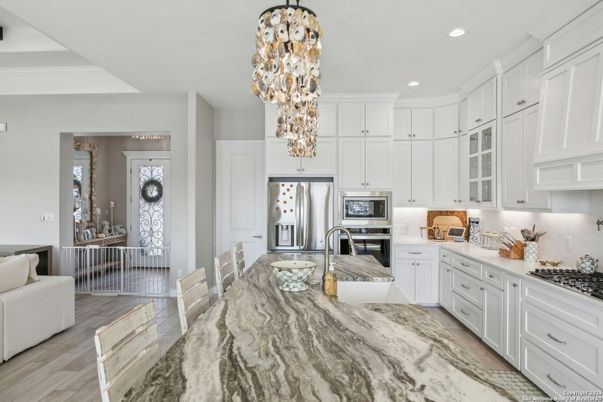 Chandelier, Interior, Kitchen, Pendant Lights, Recessed Lighting, Stainless Steel Appliances, Wood Texture Flooring