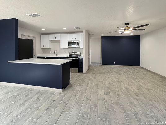 Interior, Kitchen, Recessed Lighting, Stainless Steel Appliances, Wood Texture Flooring