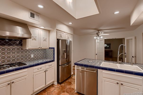 Interior, Kitchen, Recessed Lighting, Stainless Steel Appliances, Tile Countertops