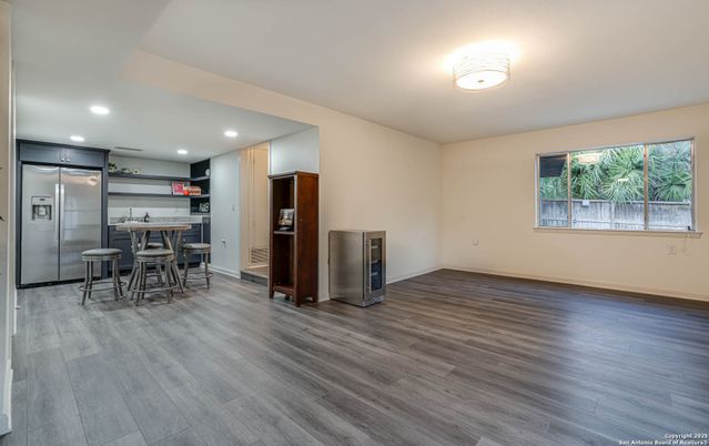 Dining room, Interior, Kitchen, Recessed Lighting, Stainless Steel Appliances, Wood Texture Flooring