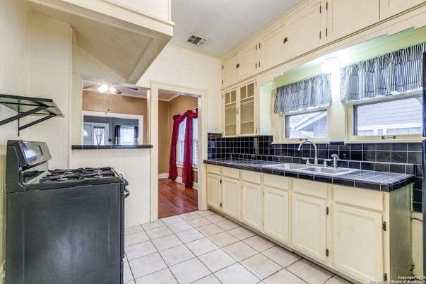 Interior, Kitchen, Tile Countertops, Wood Texture Flooring
