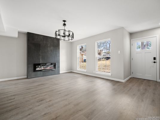 Chandelier, Empty room, Fireplace, Interior, Wood Texture Flooring