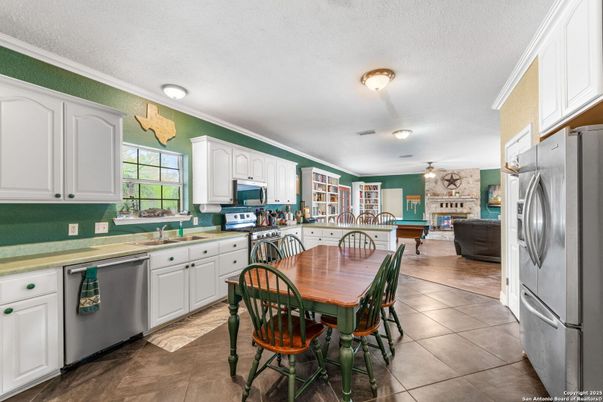Dining room, Fireplace, Interior, Kitchen, Stainless Steel Appliances