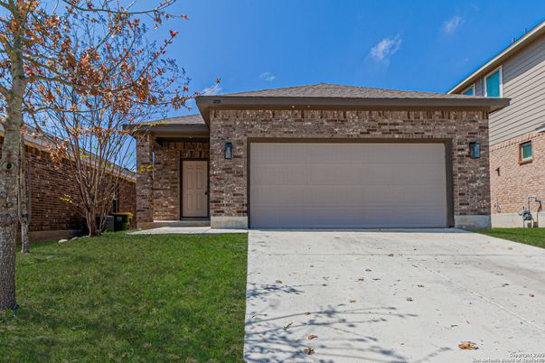 Attached, Exterior, Facade, Brick Facade, Brick Traditional