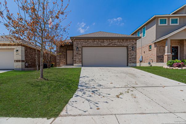 Attached, Exterior, Facade, Brick Facade, American Craftsman