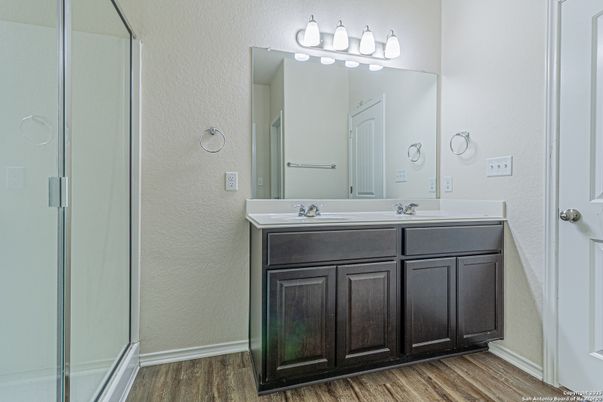 Bathroom, Dual Sink Vanities, Glass Shower, Interior, Wood Texture Flooring