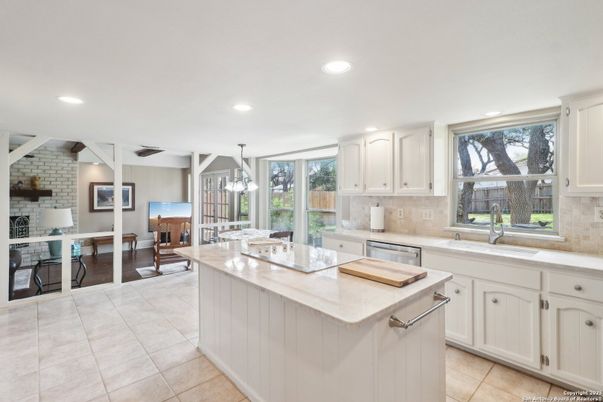 Dining room, Fireplace, Interior, Kitchen, Living room, Pendant Lights, Recessed Lighting, Stainless Steel Appliances, Stone Walls
