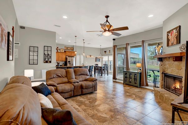 Dining room, Fireplace, Interior, Kitchen, Living room, Pendant Lights, Recessed Lighting, Stainless Steel Appliances
