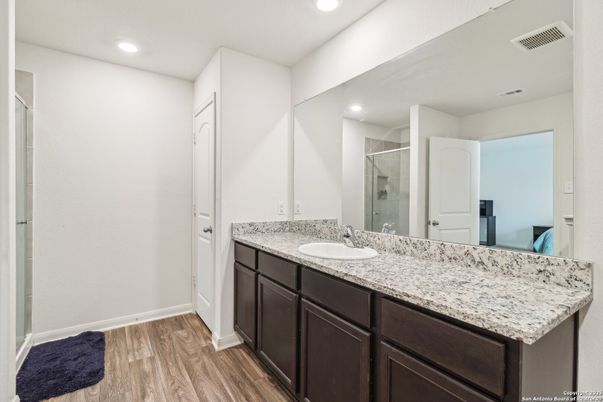 Bathroom, Dual Sink Vanities, Interior, Recessed Lighting, Wood Texture Flooring