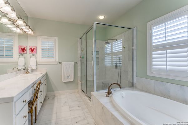 Bathroom, Dual Sink Vanities, Glass Shower, Interior, Marble, Recessed Lighting