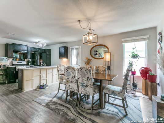 Dining room, Interior, Kitchen, Pendant Lights, Stainless Steel Appliances, Wood Texture Flooring