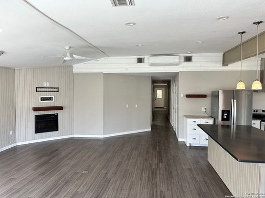 Fireplace, Interior, Kitchen, Pendant Lights, Recessed Lighting, Wood Texture Flooring