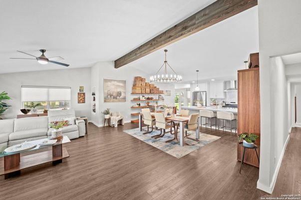 Chandelier, Dining room, Interior, Kitchen, Living room, Pendant Lights, Stainless Steel Appliances, Wooden Beams, Wood Texture Flooring