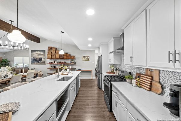 Dining room, Interior, Kitchen, Pendant Lights, Recessed Lighting, Stainless Steel Appliances, Wooden Beams, Wood Texture Flooring