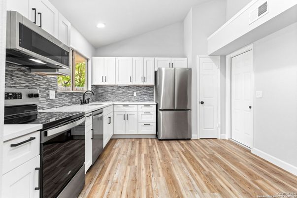 Interior, Kitchen, Recessed Lighting, Stainless Steel Appliances, Wood Texture Flooring