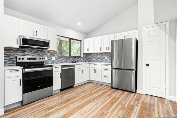 Interior, Kitchen, Recessed Lighting, Stainless Steel Appliances, Wood Texture Flooring