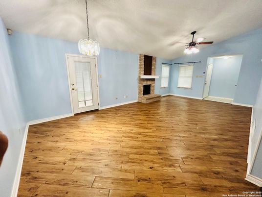 Empty room, Fireplace, Interior, Pendant Lights, Wood Texture Flooring
