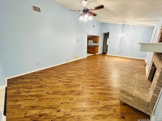 Empty room, Fireplace, Interior, Pendant Lights, Wood Texture Flooring