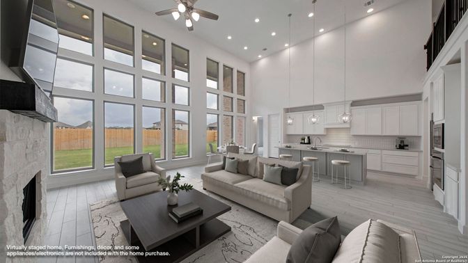 Fireplace, Interior, Kitchen, Living room, Pendant Lights, Recessed Lighting, Stainless Steel Appliances, Wood Texture Flooring