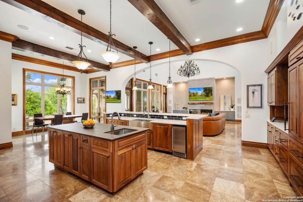 Dining room, Fireplace, Interior, Kitchen, Living room, Pendant Lights, Recessed Lighting, Stainless Steel Appliances, Wooden Beams