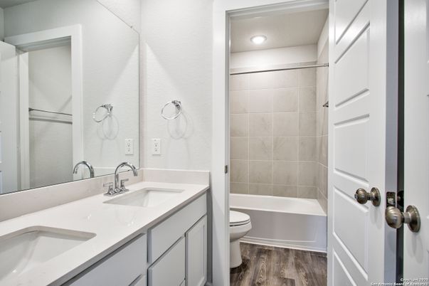Bathroom, Dual Sink Vanities, Interior, Recessed Lighting, Wood Texture Flooring