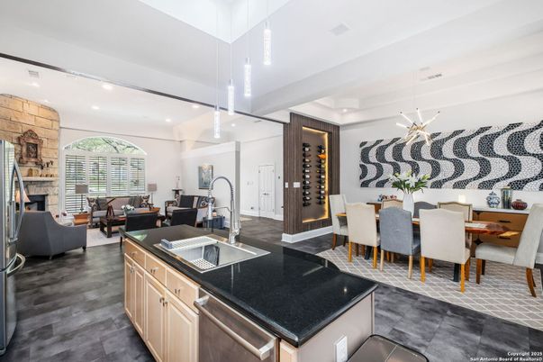 Dining room, Fireplace, Interior, Kitchen, Living room, Pendant Lights, Recessed Lighting, Stone Walls, Wood Texture Flooring