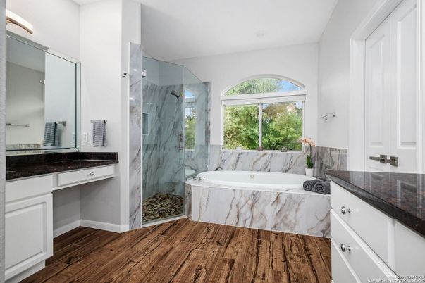Bathroom, Glass Shower, Interior, Marble Walls, Recessed Lighting, Wood Texture Flooring