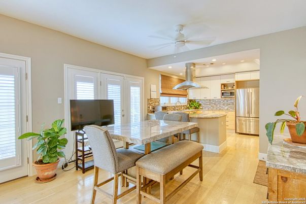 Dining room, Interior, Kitchen, Recessed Lighting, Stainless Steel Appliances, Wood Texture Flooring