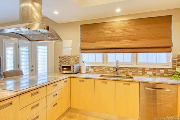 Fireplace, Interior, Kitchen, Recessed Lighting, Stainless Steel Appliances