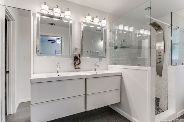 Bathroom, Dual Sink Vanities, Glass Shower, Interior, Wood Texture Flooring
