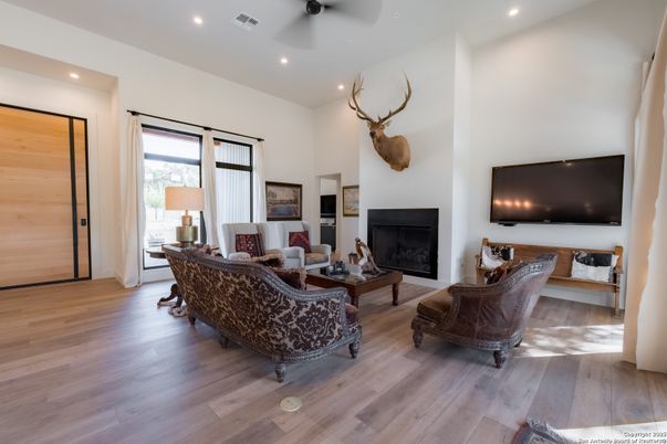 Fireplace, Interior, Living room, Recessed Lighting, Wood Texture Flooring
