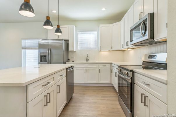 Interior, Kitchen, Pendant Lights, Recessed Lighting, Stainless Steel Appliances, Wood Texture Flooring