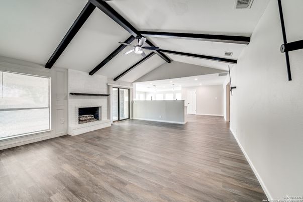 Empty room, Fireplace, Interior, Recessed Lighting, Wooden Beams, Wood Texture Flooring