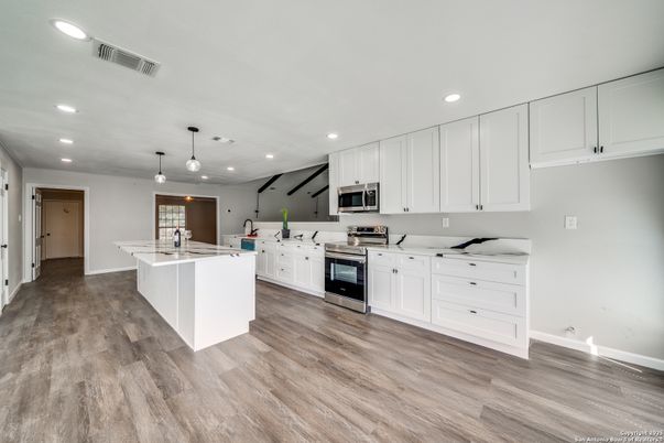 Interior, Kitchen, Pendant Lights, Recessed Lighting, Stainless Steel Appliances, Wood Texture Flooring