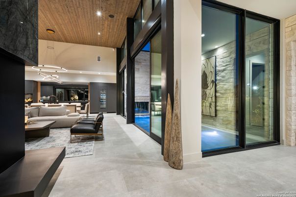 Fireplace, Interior, Living room, Pendant Lights, Recessed Lighting, Stone Walls, Wooden Ceilings