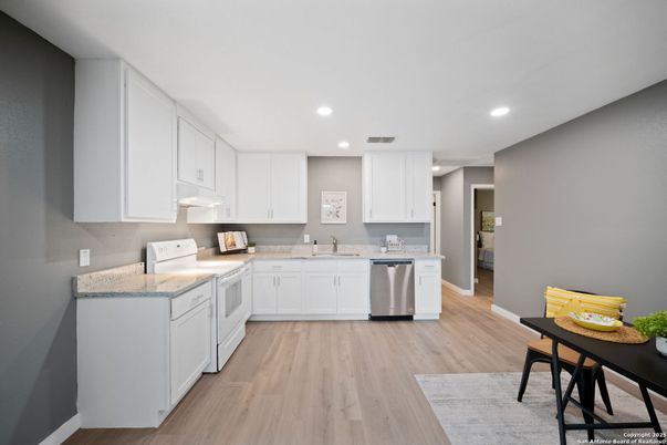 Interior, Kitchen, Recessed Lighting, Stainless Steel Appliances, Wood Texture Flooring