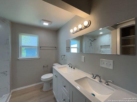 Bathroom, Dual Sink Vanities, Interior, Marble Walls, Wood Texture Flooring