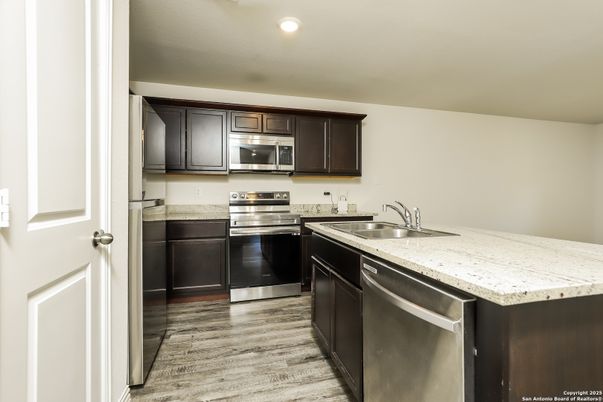 Interior, Kitchen, Recessed Lighting, Stainless Steel Appliances, Wood Texture Flooring