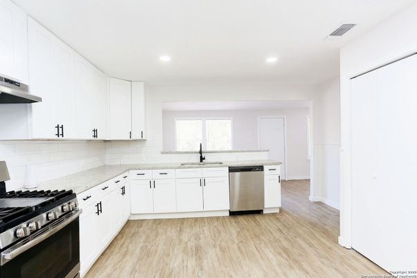 Interior, Kitchen, Recessed Lighting, Stainless Steel Appliances, Wood Texture Flooring