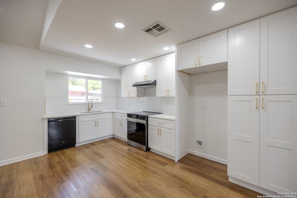 Interior, Kitchen, Recessed Lighting, Stainless Steel Appliances, Wood Texture Flooring