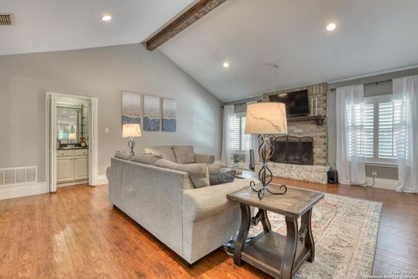 Fireplace, Interior, Living room, Recessed Lighting, Stone Walls, Wooden Beams, Wood Texture Flooring