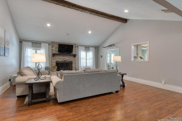 Fireplace, Interior, Living room, Recessed Lighting, Stone Walls, Wooden Beams, Wood Texture Flooring
