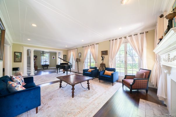 Fireplace, Interior, Living room, Piano, Recessed Lighting, Wood Texture Flooring