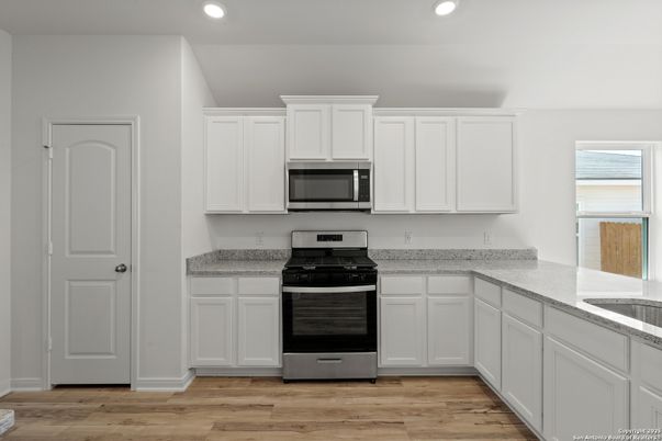 Interior, Kitchen, Recessed Lighting, Stainless Steel Appliances, Wood Texture Flooring