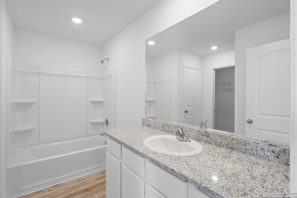 Bathroom, Dual Sink Vanities, Interior, Recessed Lighting, Wood Texture Flooring