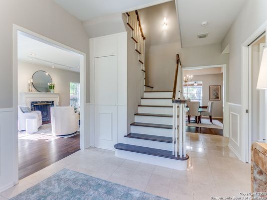 Chandelier, Dining room, Fireplace, Interior, Living room, Recessed Lighting, Wood Texture Flooring