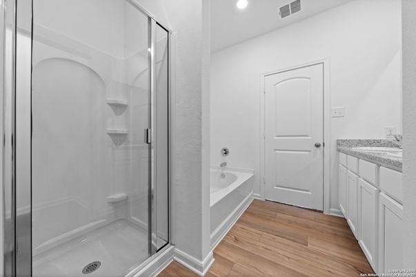 Bathroom, Glass Shower, Interior, Recessed Lighting, Wood Texture Flooring