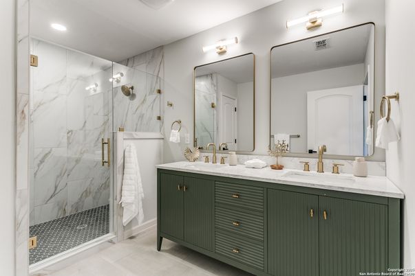 Bathroom, Dual Sink Vanities, Glass Shower, Interior, Marble Walls, Recessed Lighting